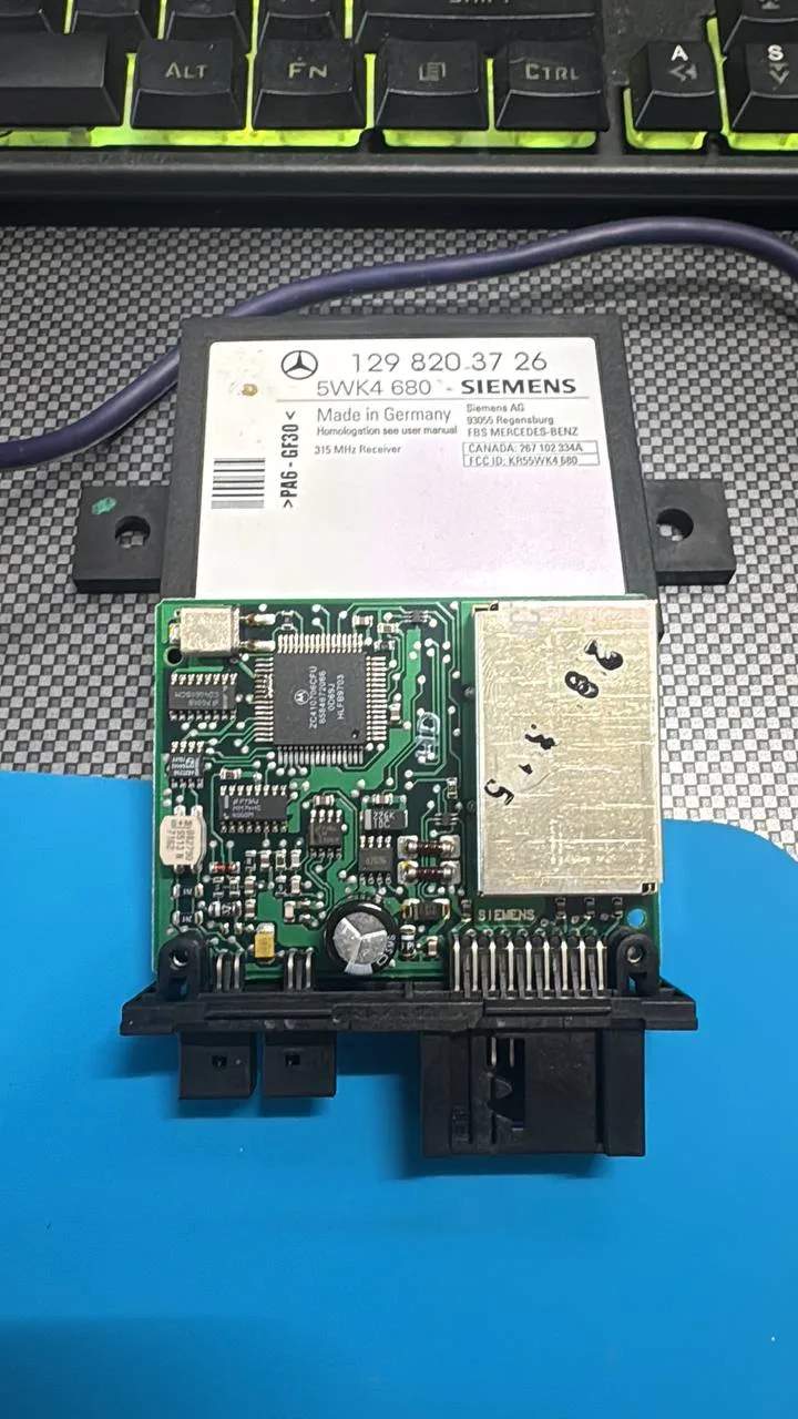 Mercedes-Benz keyless entry module and circuit board photographed during module programming work