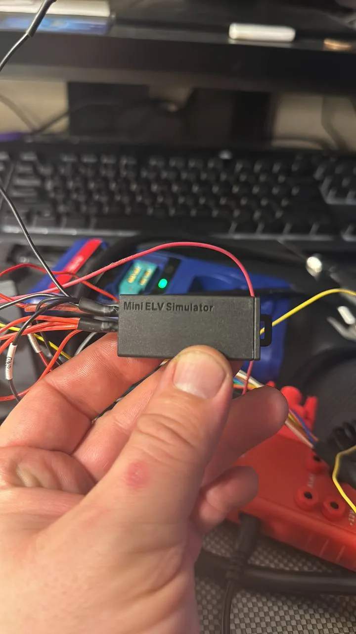 Bench ELV simulator tool wired up during electronic steering lock diagnostic work